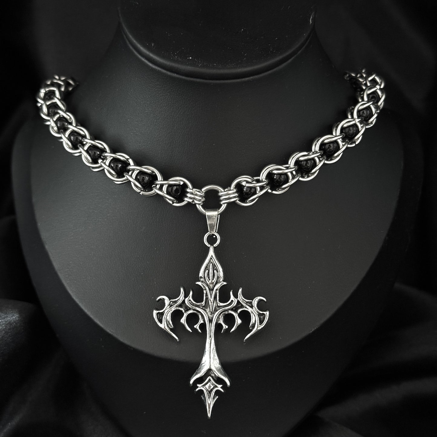 Inferno necklace flamed cross pendant and chainmail in stainless steel on mannequin