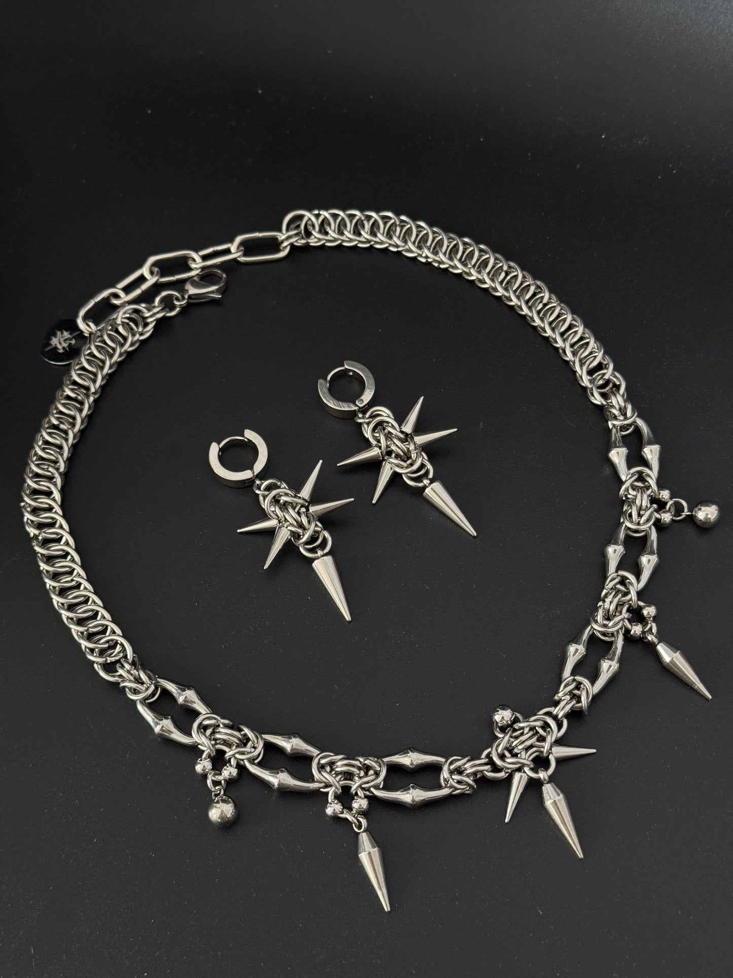 Caution chainmail necklace layflat with Adventus chainmail earrings