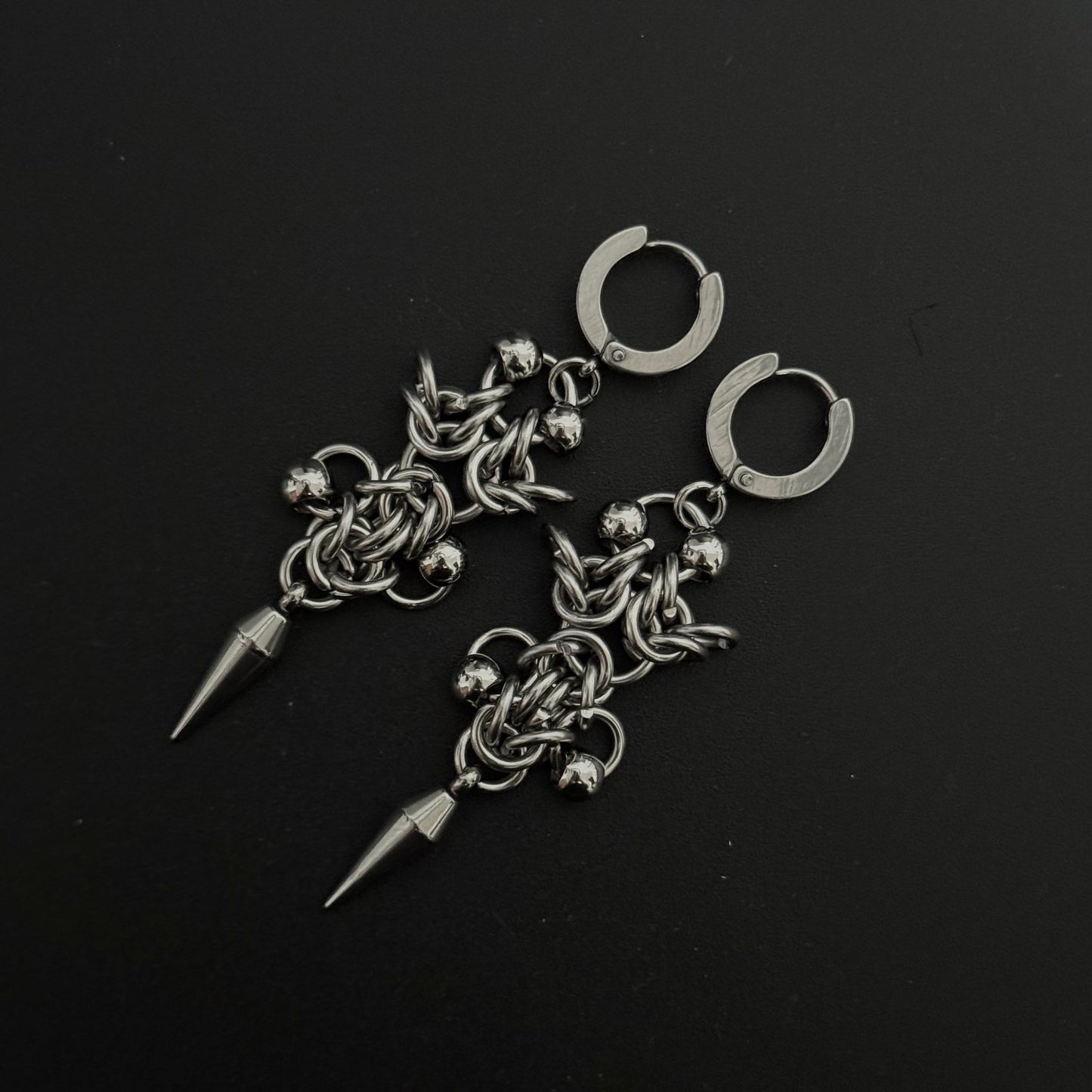 Solstice Chainmail Earrings: handmade stainless steel drop earrings with gothic-inspired details.