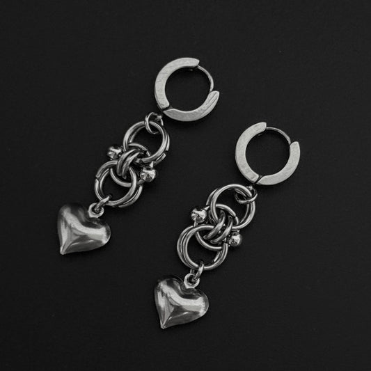 Leaf light photo of handmade alternative heart, stainless steel silver earrings